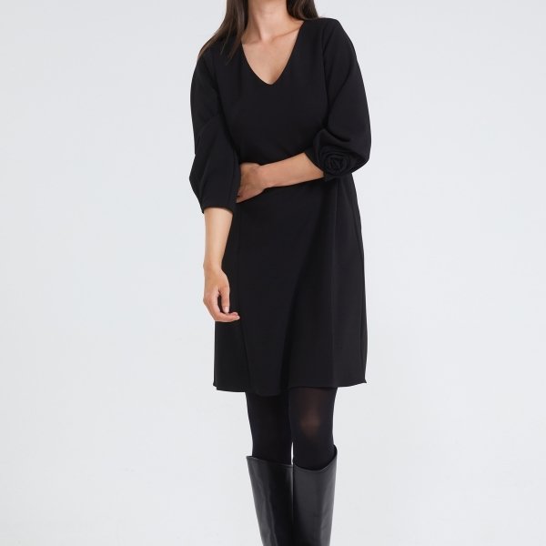 Elegante jurk met bloemdetail